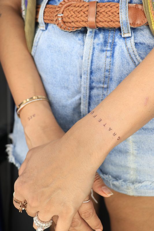 Matching grateful wrist script tattoos